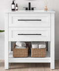 Top Notch 30 Inch Bathroom Vanity With Integrated Sink And Two Roomy Drawers Plus Handy Open Shelf with towels in baskets.