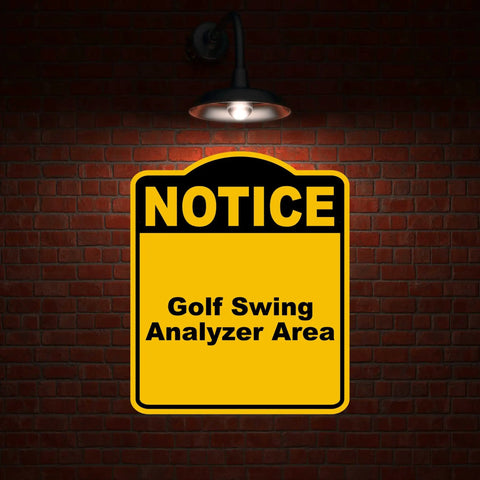 Golf Swing Analyzer Area Notice Sign In Yellow And Black Aluminum Composite Weatherproof Durable Sign Board Eight Point Five By Ten Inches Displayed on Brick Wall