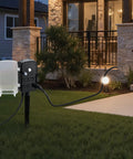 Outdoor Power Stake With Weatherproof Cover And Overload Protection No Fuss 50 Ft Extension Cord Six Outlets 15A 1875W Waterproof Power Strip For Halloween And Christmas Lights And Other Outdoor Gadgets in lawn by porch