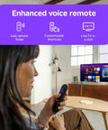 User holding an enhanced voice remote for the 55 Inch QLED Smart TV with Sharp 4K Resolution And Rich HDR10 Colors.