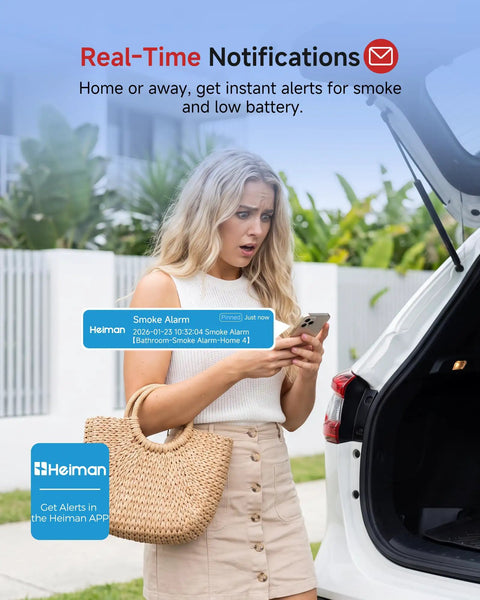 A woman receiving real-time alert on her phone from Smart Wireless Interconnected Smoke Detectors 6 Pack With Central Gateway Hub UL 217 Certified Home Security System.