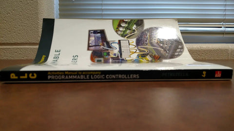 Side view of Hands On Activities Manual For Programmable Logic Controllers Practical PLC Installation And Programming Exercises book.
