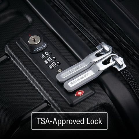 Close-up of TSA lock on Samsonite hard shell carry-on luggage