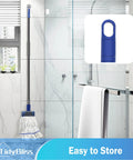 Heavy Duty Commercial String Mop With Extension Handle Absorbs Liquids And Debris Fast in a modern bathroom setting.