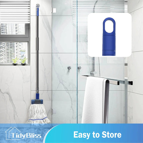 Heavy Duty Commercial String Mop With Extension Handle Absorbs Liquids And Debris Fast in a modern bathroom setting.