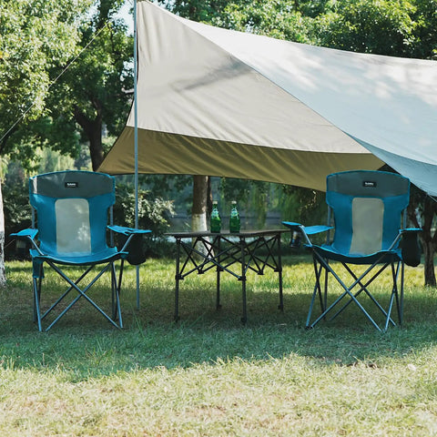 Two blue Heavy Duty Camping Folding Chairs For Adults With Cup Holder And Cooler Pouch under a canopy with table outdoors.