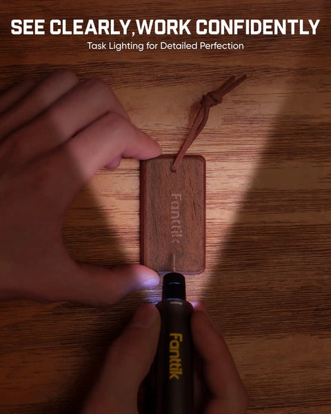 Person using Cordless Engraving Pen Kit With 5 Variable Speeds, Pro Grade Rechargeable Engraver Pen With 20 Bit Set to engrave wooden tag