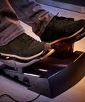 Precision Flight Sim Rudder Pedals for PS5, Xbox, and PC with long travel axis in use, showing foot control angle.