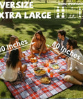 Oversized Picnic Blanket 80 By 80 Inches Waterproof And Sandproof For Beach Park Camp Ground Mat with four people enjoying a picnic.
