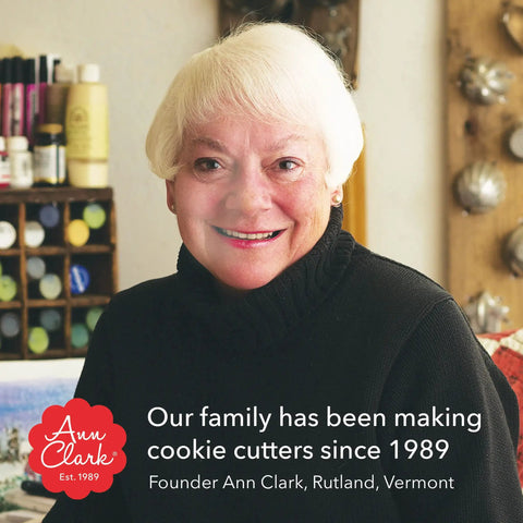 Smiling woman indoors with text about family cookie cutter business.