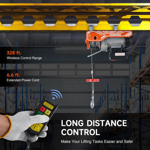 CREWORKS electric hoist side view mounted to warehouse ceiling; orange housing with hook and 328 ft wireless remote range.