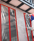 Worker installing Heavy Duty Zipper For Dust Barriers Pack Of 6 Rolls 7 Ft By 3 Inch Red Self Adhesive Construction Door Zippers