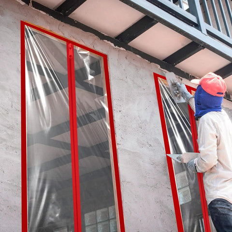Worker installing Heavy Duty Zipper For Dust Barriers Pack Of 6 Rolls 7 Ft By 3 Inch Red Self Adhesive Construction Door Zippers