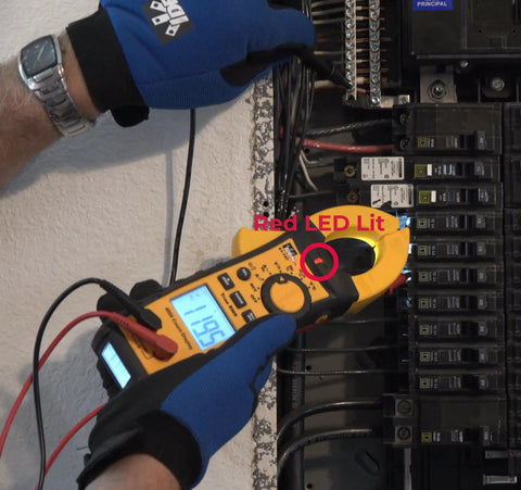 Electrician using Job Site Ready Pro Grade TightSight 61-747 Digital Clamp Meter For 400 Amp 600 Volt Range in panel.