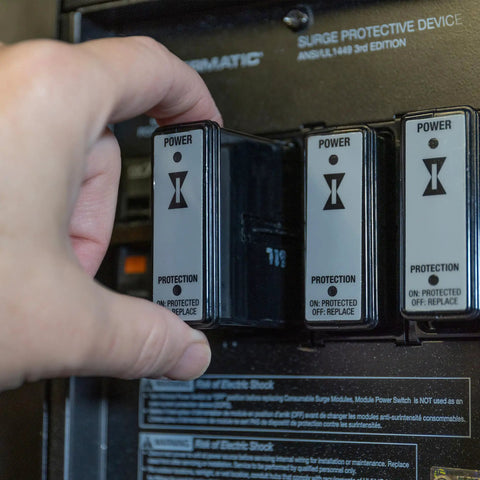 Hand installing IG120RSM10K Replacement Module For Smart Guard Whole Home Surge Protector With Quick No Wiring Install and LED Status Indicators