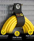 Heavy Duty Storage Straps Six Pack For Garage Cord Management holding yellow extension cord