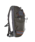 Side view of Ridgeline Fly Fishing Backpack For Real Anglers, showcasing hydration pass-through, foam shoulders, and top pockets.