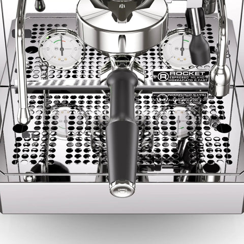 Close-up view of Top Tier Chrome Espresso Machine Cranking Out Perfection With A Rotary Pump Heat Exchanger And PID Temp Control.