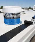 Big Time Roof Saver Black Waterproof Rubber Sealant For Flat And Metal Roofs With Flexible Crack Bridge that Moves With Building Shifts and Locks Out Water Damage For Good Without Any Headaches in a quart container.