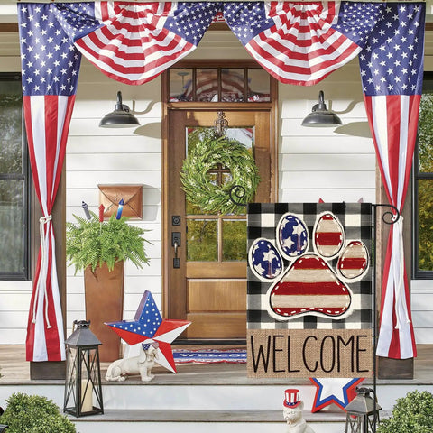 Patriotic USA Flag Paw Print Garden Flag 12x18 Double Sided Outdoor Welcome Banner in front of a house with American flag decor.