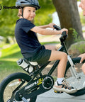 Child on bike using Universal One Piece Crankarm Set For 20 Inch Bikes Black Durable Crank Kit For Freestyle And Stargirl Bicycles.