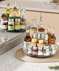 360 Degree Rotating Organizer Turntable for Kitchen Cabinets holding assorted bottles and jars on countertop