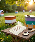 White Plastic Queen Marker Cage Clip Beekeeping Tool for Easy Queen Capture and Marking on table in apiary
