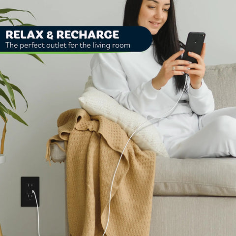 Woman using High Speed USB Wall Outlet With Tamper Resistant Receptacles, Dual USB Ports Up To 2.4A Each, Nickel Finish in living room
