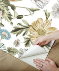 Vintage Poppy Pink Peel And Stick Wallpaper being applied to a wall with floral design, easy removal shown, 20.5 inch by 18 feet.