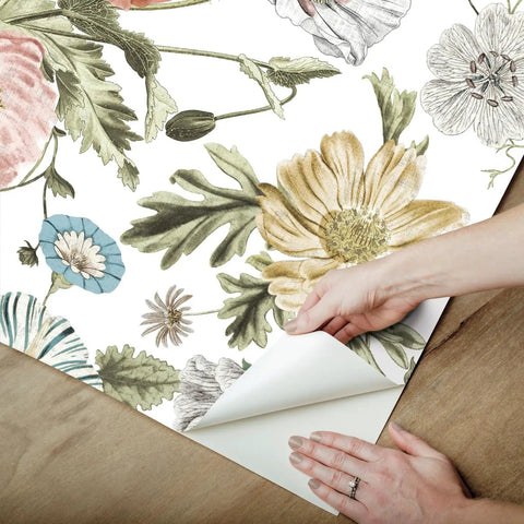 Vintage Poppy Pink Peel And Stick Wallpaper being applied to a wall with floral design, easy removal shown, 20.5 inch by 18 feet.