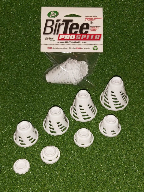 Pro Speed Indoor Golf Tees Eight Pack With Enhanced Durability, Flexible Plastic, White Tees on Green Turf