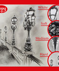 Charcoal drawing of ornate lamp posts with focus on white, soft, medium, and hard shading techniques.