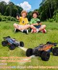 Two children playing with Beast Of An All Terrain Off Road RC Car With 4WD, 1:20 Scale Fast Electric RC Truck on grass