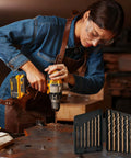 StratMet 13-piece cobalt drill bit set with indexed storage case, shown beside a cordless drill in a workshop.