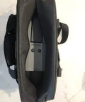 Open top view of New Improved Travel Bag Case for Nespresso Essenza Mini and Pixie With Extra Interior Padding, carrying a coffee maker.