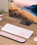 Clear Acrylic Tilted Keyboard Stand For Ergonomic Typing Low Front Lip Keeps Your Keys In Place Silicone Non Slip Pad Slim Desk Setup Riser Fits Most Full Size Keyboards For Any Office Or Home Desk, shown with pink keyboard on wooden desk.