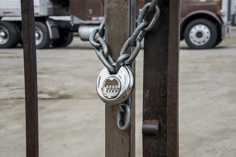 Heavy Duty 80mm Resettable Four Dial Padlock With Chrome Plated Hardened Steel Shackle securing gate with chain