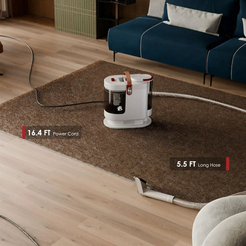 Portable Upholstery And Carpet Cleaner With 15KPa Suction And 500W Motor in living room on rug showing power cord and hose