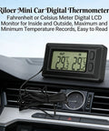 Front view of black Riloer mini car digital thermometer with LCD displaying inside/outside temperatures on the dashboard