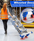 Heavy Duty Multi Position Telescoping Ladder With Smooth Roll Wheels 14 Ft Reach being wheeled in a storage area for easy mobility.