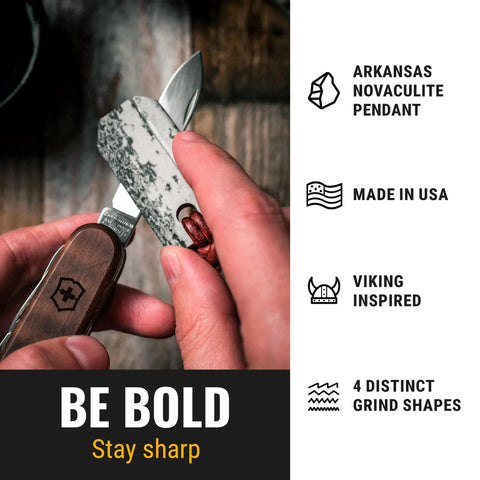 Hand holding Whetstone Pendant EDC Knife Sharpener Stone On Leather Cord With Arkansas Novaculite, Norse Knotwork, Handmade In USA.