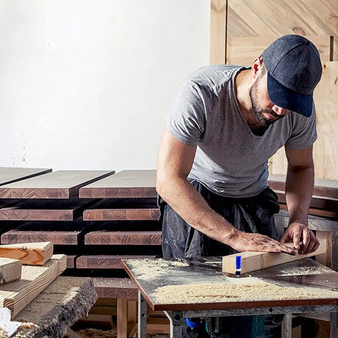 A woodworker using the Workhorse Pro Grade Flush Trim Router Bit Set Four Piece One Quarter Inch Shank Carbide Tipped Premium Alloy.