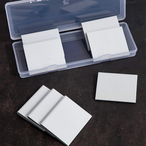 Door corner seals, white foam, self-adhesive, 8 pieces in a clear plastic storage case.