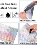Dope Metallic Bubble Mailers Set, 50 Self Seal Padded Envelopes, shown resisting tear and sharp objects, holographic design