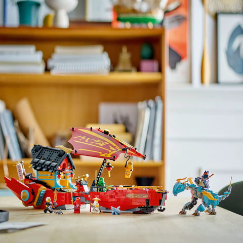 Ninjago Destiny's Bounty Race Against Time 71797 Airship Battle Set with minifigures and dragons in a playroom setting