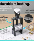 Top Shelf Heavy Duty Self Inking Date Stamp Black Customizable Up To Four Lines Of Text on paperwork with metal frame.