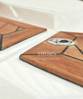 Close-up of Thorn 2-inch stainless steel flush pull slam latch installed on wood-grain boat hatch panels.
