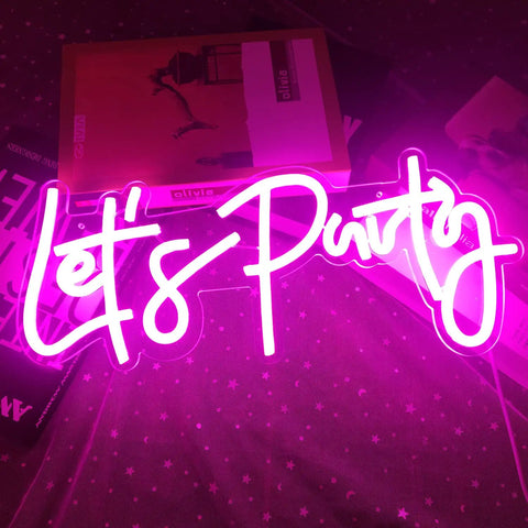 Lit Dimmable LED Neon Sign For Wall Decor 16x7 Inches White Neon Art Light Perfect For Bachelorette Parties Engagements Birthdays And Wedding Celebrations, "Let's Party" in bright pink.
