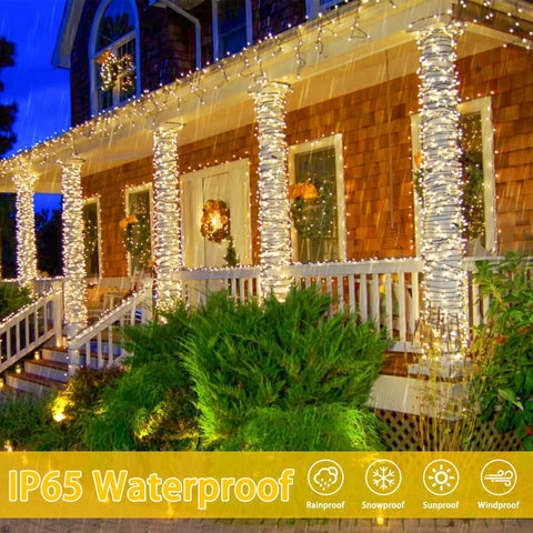 2 Pack 480 LED Solar String Lights For Outside 170 Ft Outdoor Christmas Lights With 8 Modes And Memory Function Waterproof Twinkle String Lights For Xmas Tree And Party Decor Warm White illuminating porch columns at night with IP65 waterproof feature displayed.