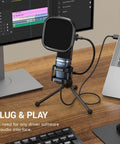 USB Podcast Microphone With Cardioid Condenser Pickup, Tripod Stand and Pop Filter on desk, connected to laptop for plug and play